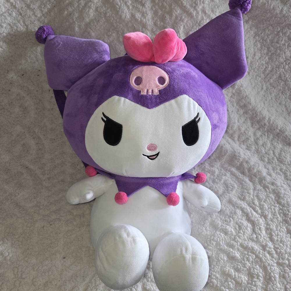 Purple and White Plush Toy